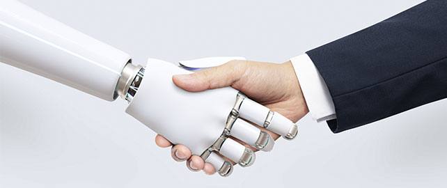 Poignée de main entre homme et robot